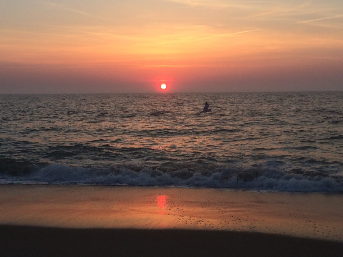 ocean sunset with red reflections